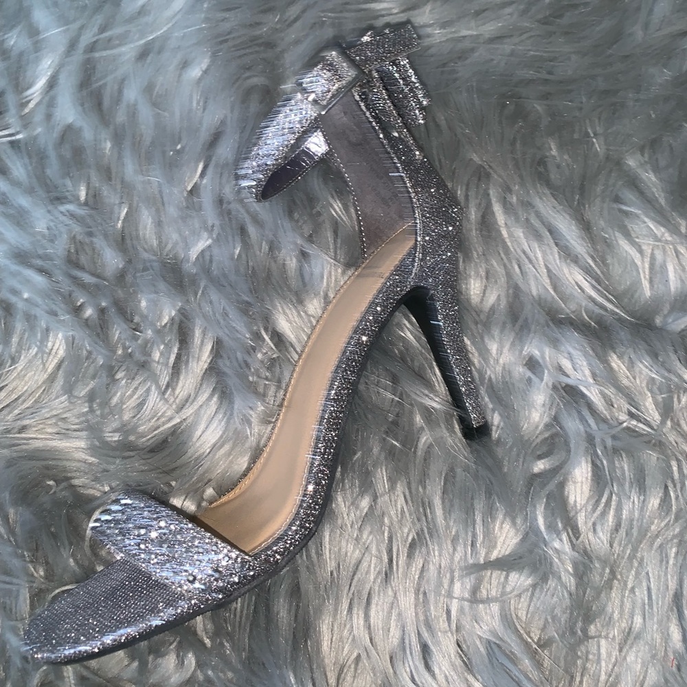 Silver heels with bow on the back